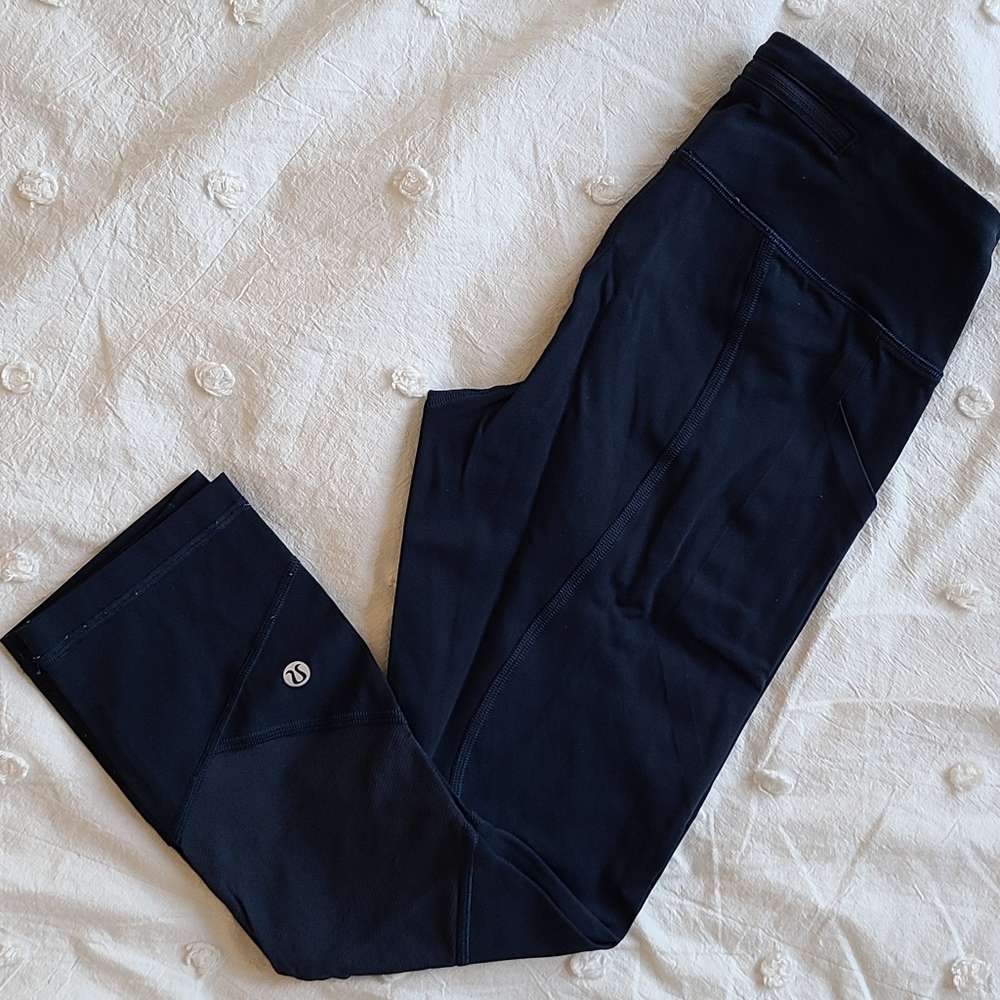 Lululemon "pace rival" mid-rise crop leggings, 22 inch inseam, size 4